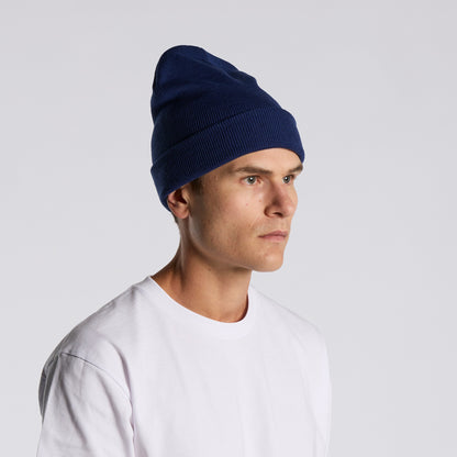 man in white tshirt wearing an as colour colour acrylic cuff beanie in colbat blue